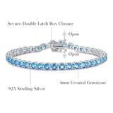 "Joyful Delight" Blue Topaz Tennis Sterling Silver Bracelet