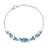“Wisteria Whisper” Flower Bar Blue Topaz Silver Bracelet