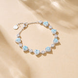 FANCIME "Ms Charming" Halo Heart Aquamarine Sterling Silver Tennis Bracelet