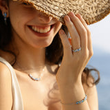 “Wisteria Whisper” Flower Bar Blue Topaz Silver Ring