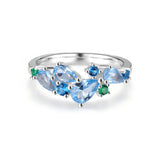 “Wisteria Whisper” Flower Bar Blue Topaz Silver Ring