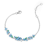 “Wisteria Whisper” Flower Bar Blue Topaz Silver Bracelet