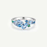 “Wisteria Whisper” Flower Bar Blue Topaz Silver Ring