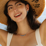 “Wisteria Whisper” Flower Bar Blue Topaz Silver Necklace