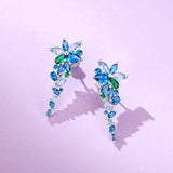 「ウィステリア・ウィスパー」フラワーバー ブルートパーズ シルバーイヤリング