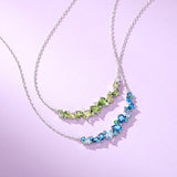 “Wisteria Whisper” Flower Bar Blue Topaz Silver Necklace