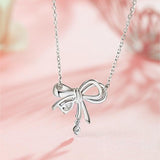 FANCIME "Satin Bow" Bow Pink CZ Sterling Silver Necklace