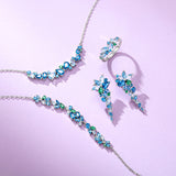 “Wisteria Whisper” Flower Bar Blue Topaz Silver Ring