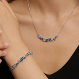 “Wisteria Whisper” Flower Bar Blue Topaz Silver Necklace