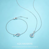 "Infinite Embrace" March Birthstone Aquamarine Infinity Symbol Sterling Silver Bracelet
