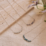 “Wisteria Whisper” Flower Bar Blue Topaz Silver Necklace