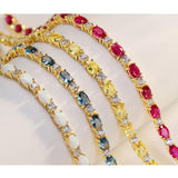 "Glamour Radiance" July Birthstone Fancy Cut Tennis Ruby Sterling Silver Bracelet