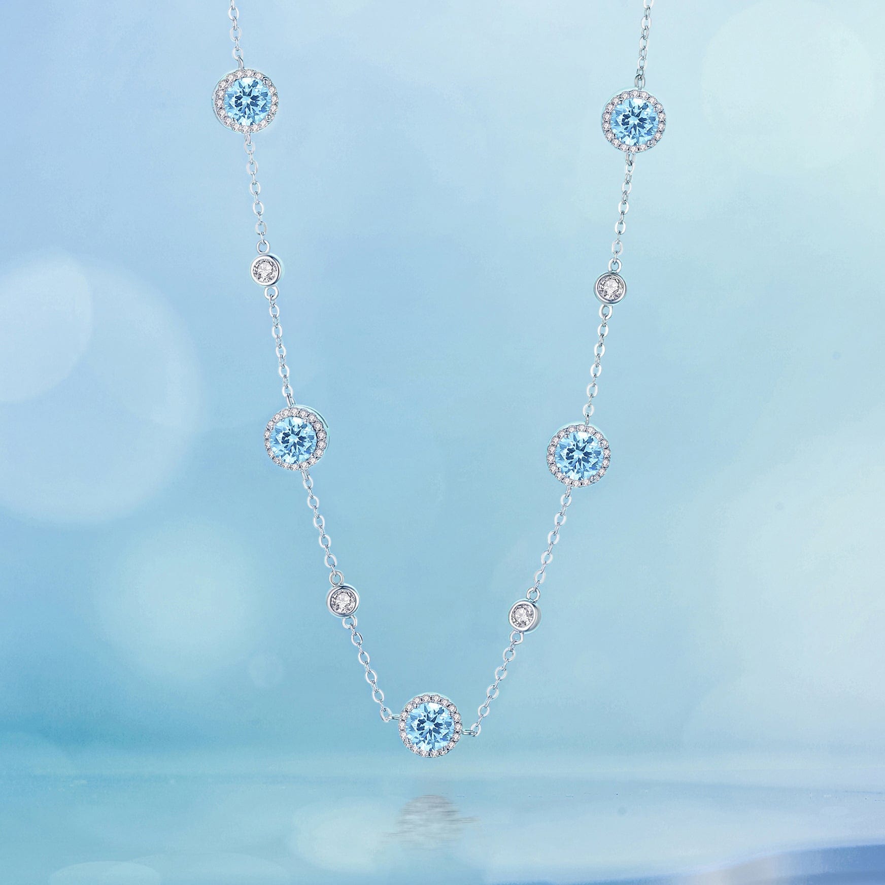 FANCIME "Heavenly Blue" Halo Setting Round CZ Station Sterling Silver Necklace Detail