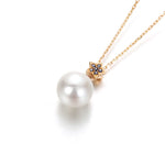 Rose gold star pendant with blue sapphire and 8mm Japanese Akoya pearl 