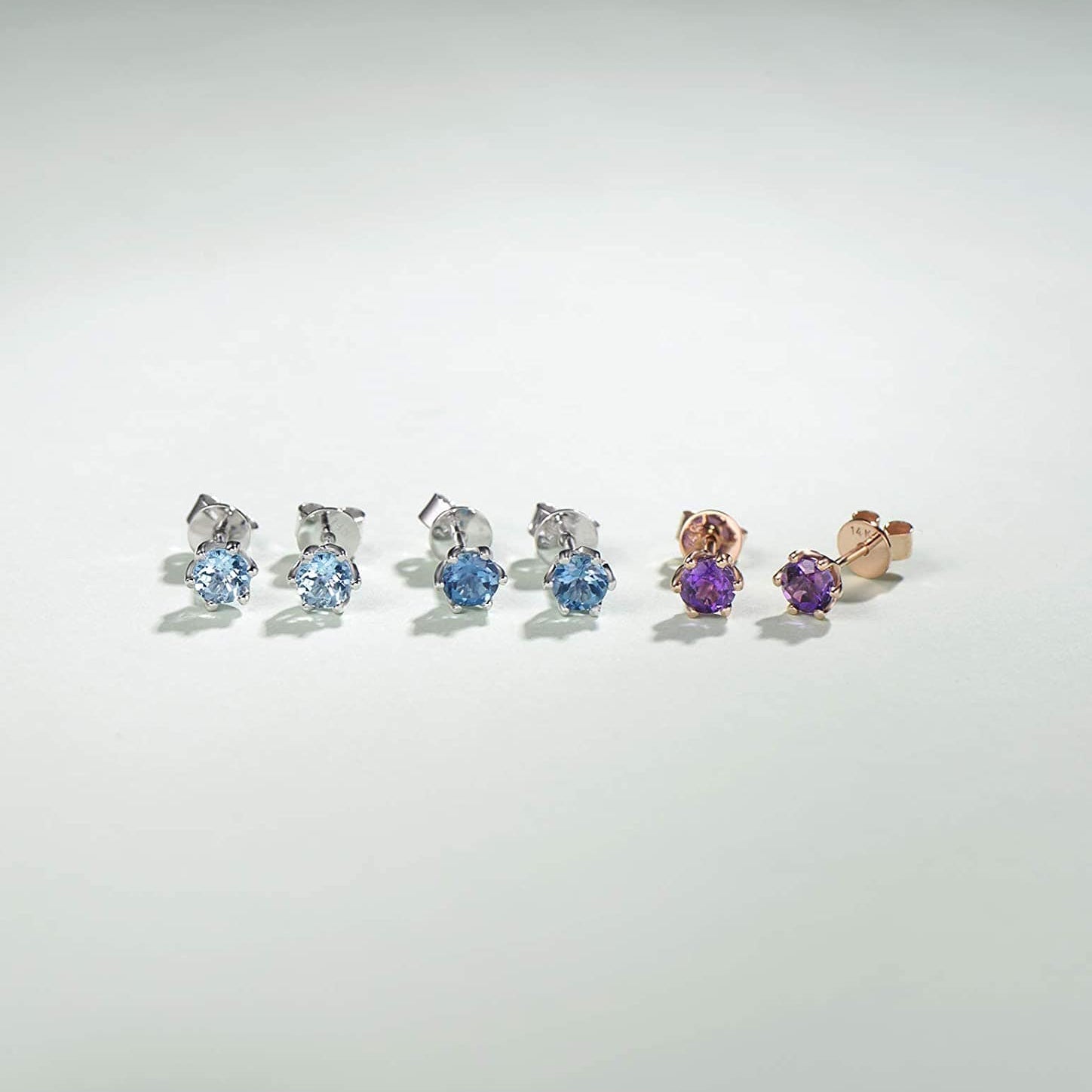 Flower setting gemstone birthstone aquamarine studs in 14k gold