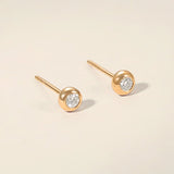 Dazzling white gold stud earrings in 18k rose gold