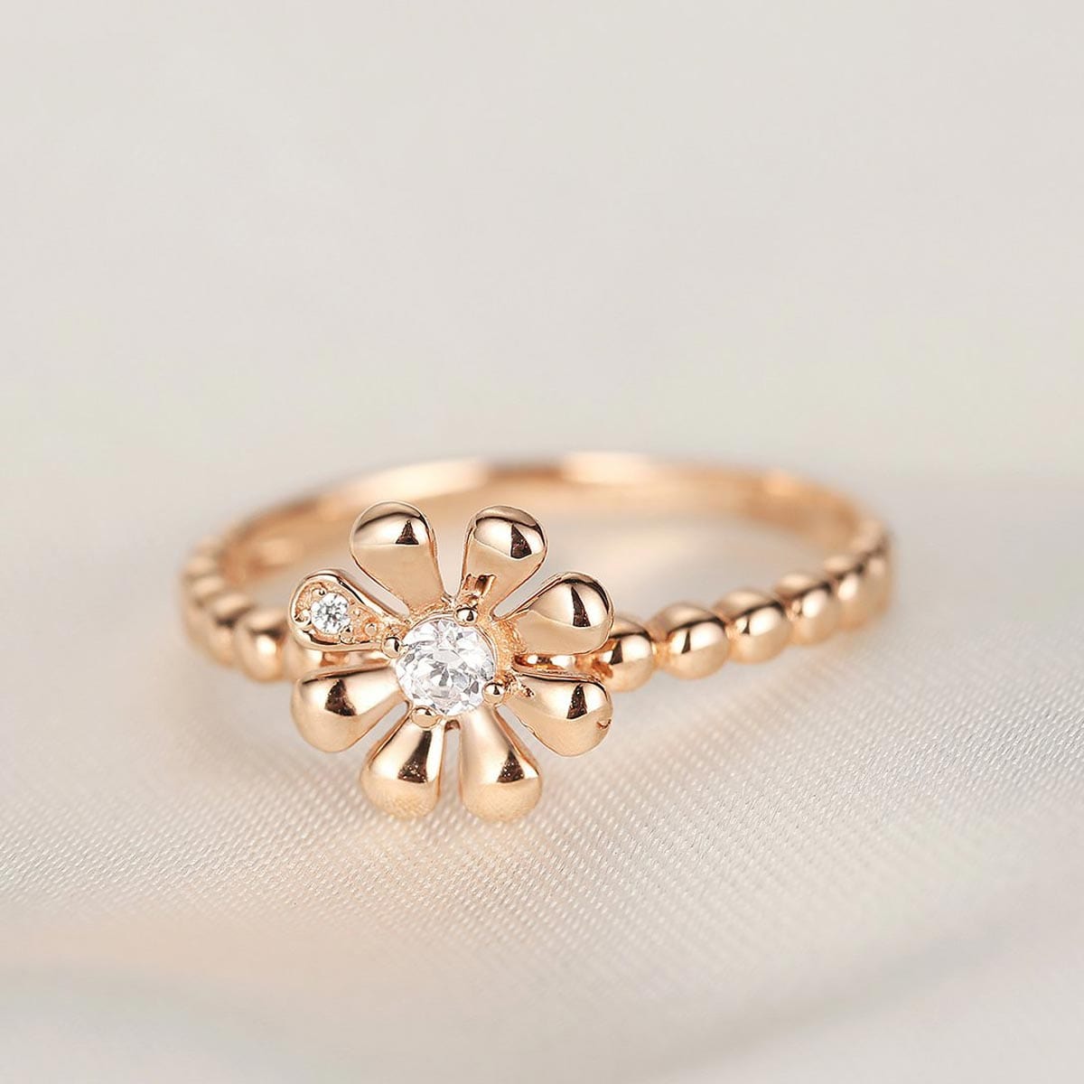 Blooming flower with white diamond 14k rose gold bead ring band