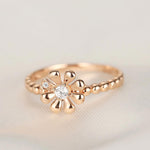 Blooming flower with white diamond 14k rose gold bead ring band