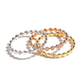 Diamond bead ring band in three different gold colors
