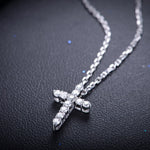 white diamond round stone cross pendant